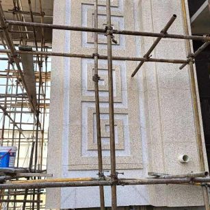 青岛 黄金麻花岗岩别墅外墙干挂回纹造型效果