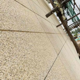 青岛 黄金麻花岗岩荔枝面外墙干挂石材效果示例