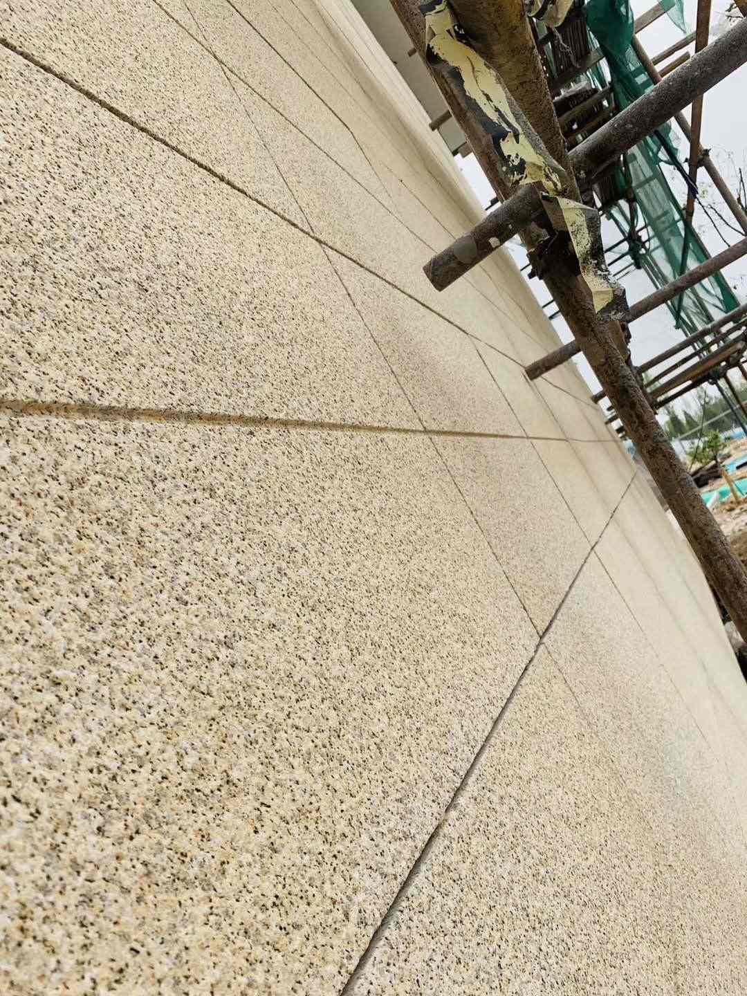 青岛 黄金麻花岗岩荔枝面外墙干挂石材效果示例